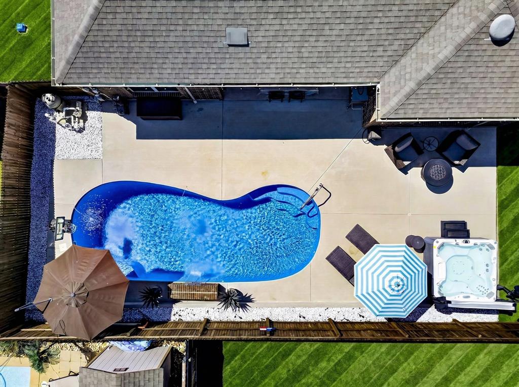 2816 Permian Road Aubrey, TX 76227 - Photo 23 of 36 Aerial view of property and surrounding area with a pool