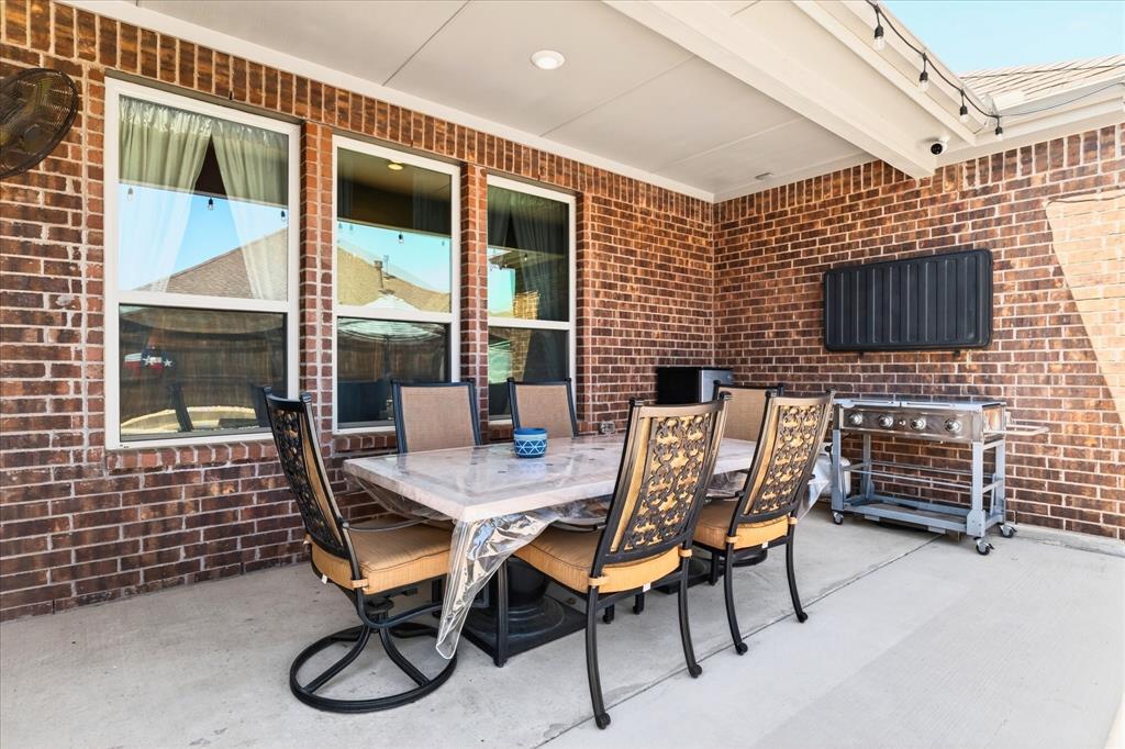 2816 Permian Road Aubrey, TX 76227 - Photo 24 of 36 View of patio / terrace featuring outdoor dining area