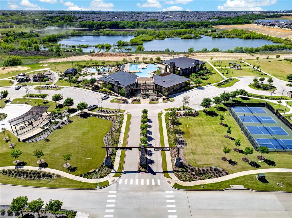 2816 Permian Road Aubrey, TX 76227 - Photo 35 of 36 Drone / aerial view of a nearby body of water
