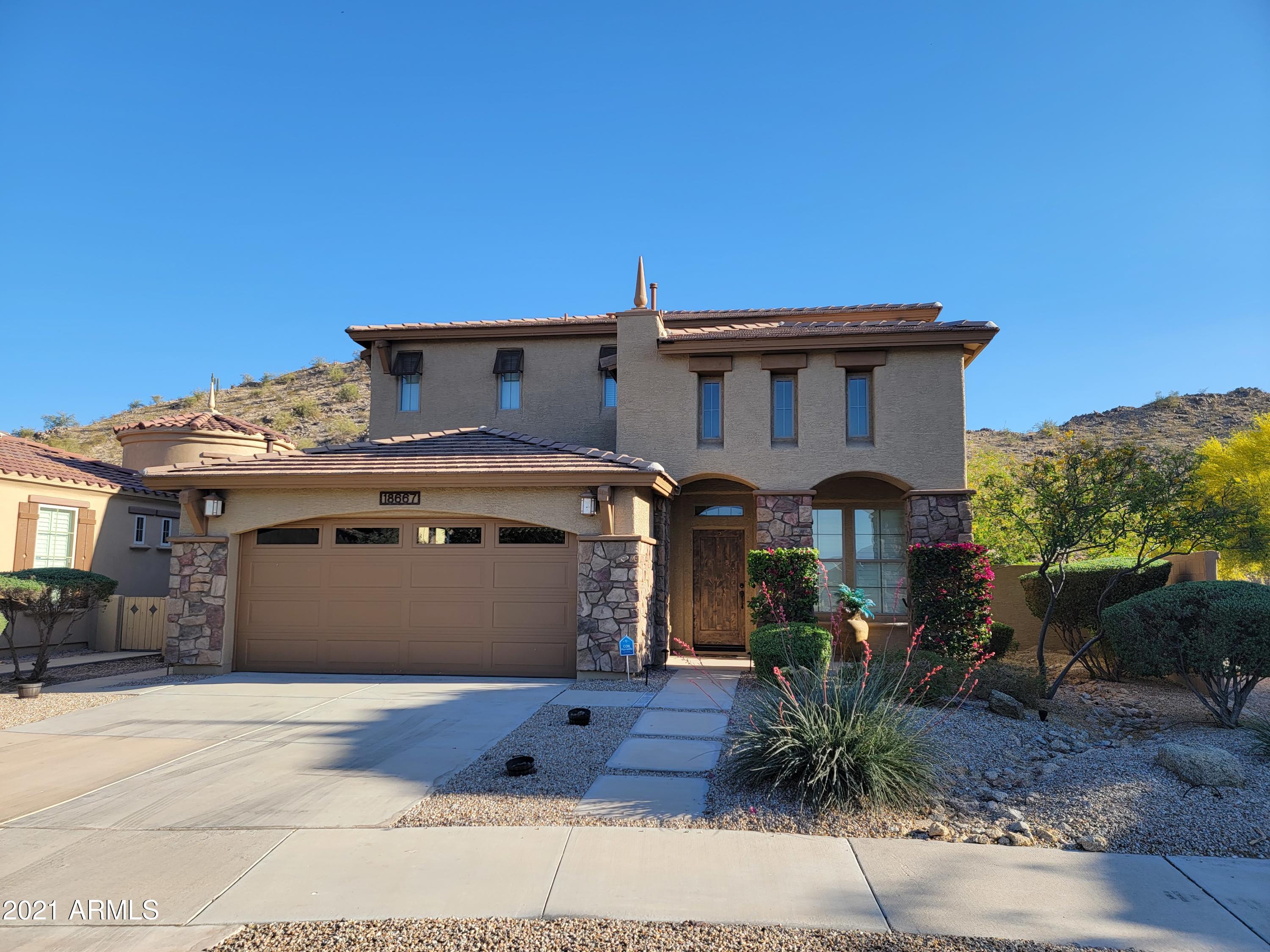 18667 Verdin Road Goodyear, AZ 85338 - Photo 1 of 28 20210407_170237