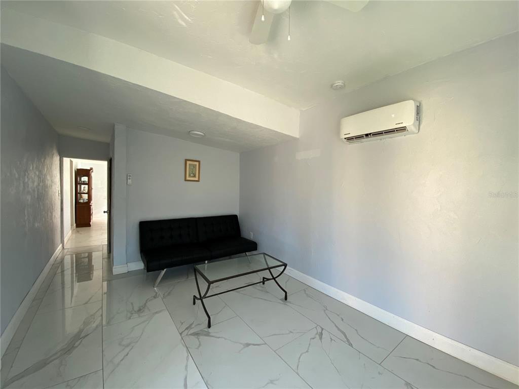 910 Lake Avenue Edgewater, FL 32132 - Photo 16 of 23 a living room with a couch