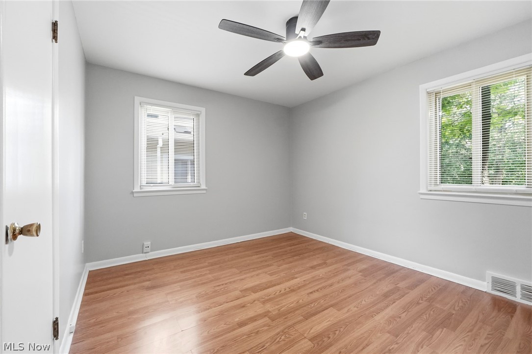 2537 Edgewood Road Beachwood, OH 44122 - Photo 27 of 39 Room featuring wood-finish flooring, light grey painted walls, and white trim