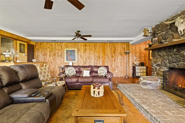 a bathroom with a toilet sink vanity and mirror
