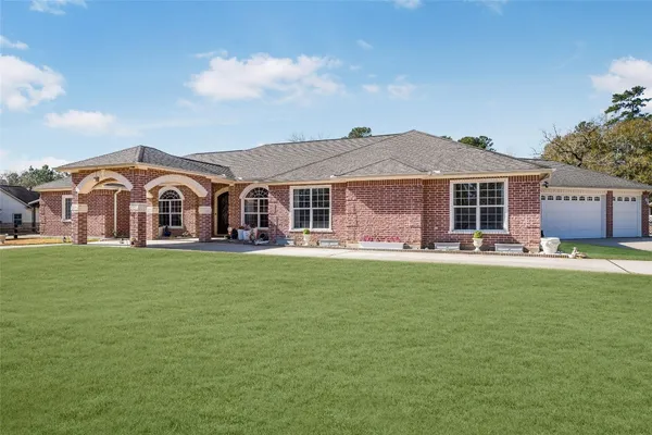 $969,900 | 33519 Hillside Drive, Pinehurst, TX 77362