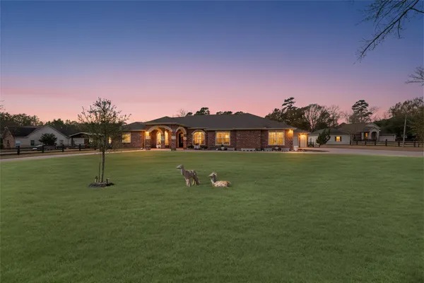 $975,000 | 33519 Hillside Drive, Pinehurst, TX 77362