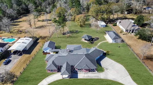 $975,000 | 33519 Hillside Drive, Pinehurst, TX 77362