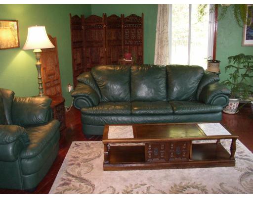 10 Common Street Norwell, MA 02061 - Photo 12 of 27 a living room with furniture and a couch