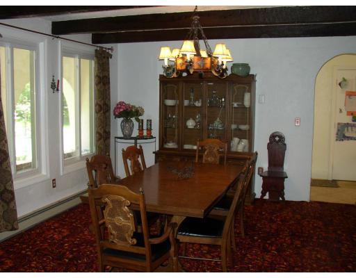 10 Common Street Norwell, MA 02061 - Photo 20 of 27 a view of a dining room with furniture and chandelier