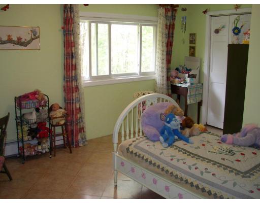 10 Common Street Norwell, MA 02061 - Photo 24 of 27 a bedroom with a bed and a window