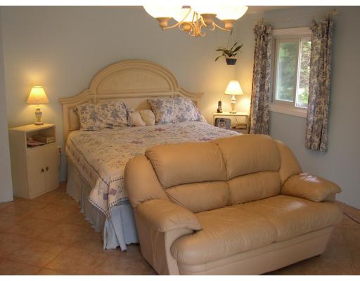 10 Common Street Norwell, MA 02061 - Photo 27 of 27 a bedroom with a bed and window