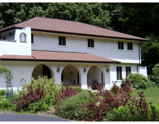 10 Common Street Norwell, MA 02061 - Photo 4 of 27 a view of a house with tub and garden