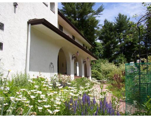 10 Common Street Norwell, MA 02061 - Photo 8 of 27 a front view of a house with a yard
