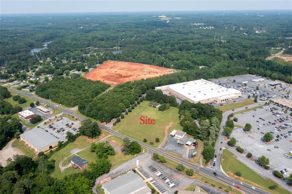 222 Brown Road Anderson, SC 29621 - Photo 2 of 12 A spacious, centrally located commercial plot awaits your vision, surrounded by green landscapes.