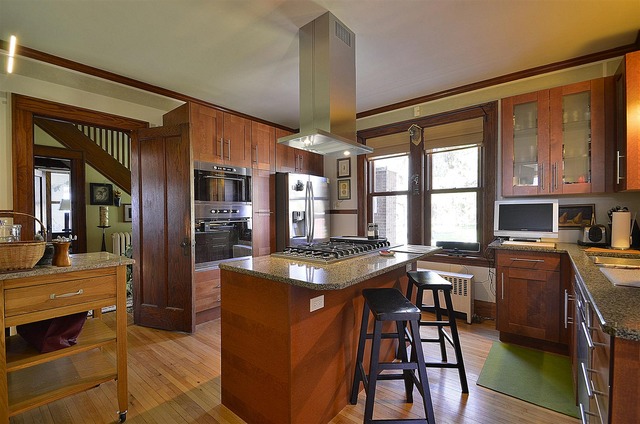 43W424 Burlington Road Elgin, IL 60124 - Photo 12 of 25 a kitchen with stainless steel appliances granite countertop a stove and a refrigerator