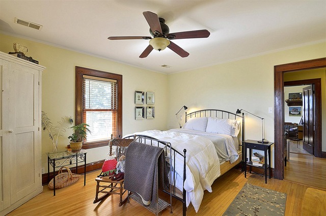 43W424 Burlington Road Elgin, IL 60124 - Photo 15 of 25 a bed room with a bed and a window