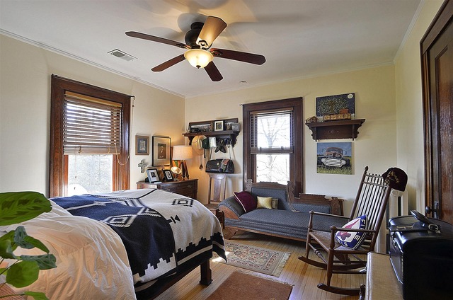 43W424 Burlington Road Elgin, IL 60124 - Photo 17 of 25 a bed room with a bed window and a chair