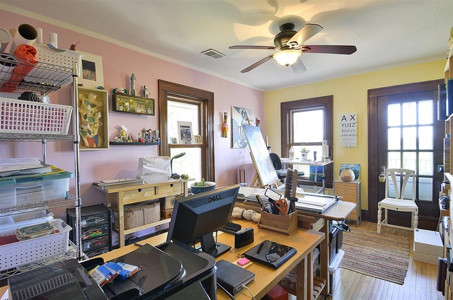 43W424 Burlington Road Elgin, IL 60124 - Photo 18 of 25 a work room with furniture and wooden floor