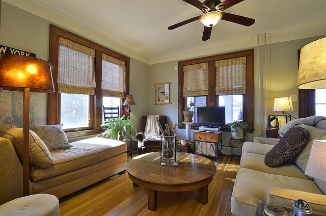 43W424 Burlington Road Elgin, IL 60124 - Photo 6 of 25 a living room with furniture a ceiling fan and a flat screen tv
