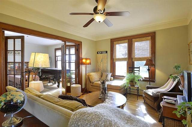 43W424 Burlington Road Elgin, IL 60124 - Photo 7 of 25 a living room with furniture fireplace and a large window