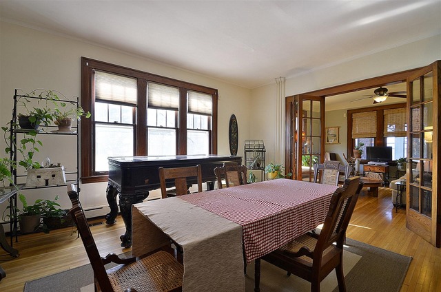 43W424 Burlington Road Elgin, IL 60124 - Photo 8 of 25 a view of a dining room with furniture window and wooden floor