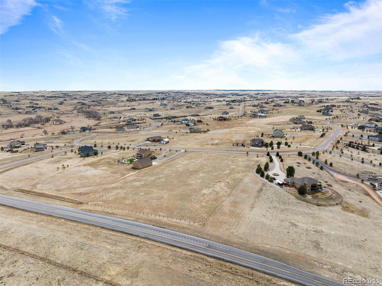 2397 Antelope Ridge Trail Parker, CO 80138 - Photo 6 of 9 an aerial view of beach and ocean