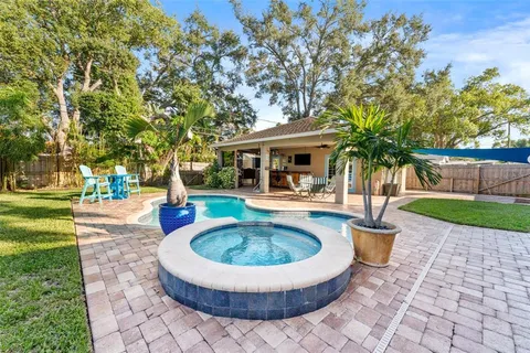 a view of a house with a swimming pool