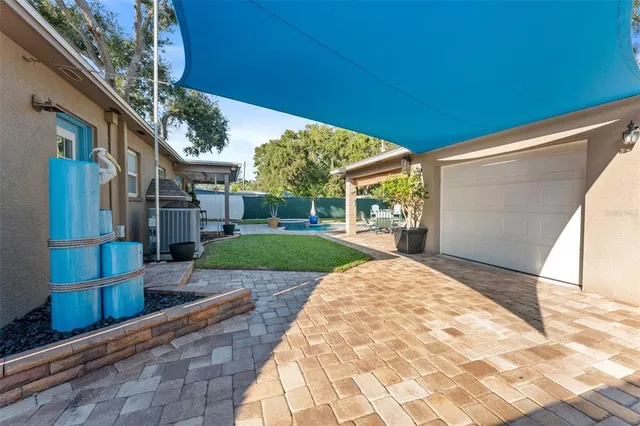 a view of a backyard with garden