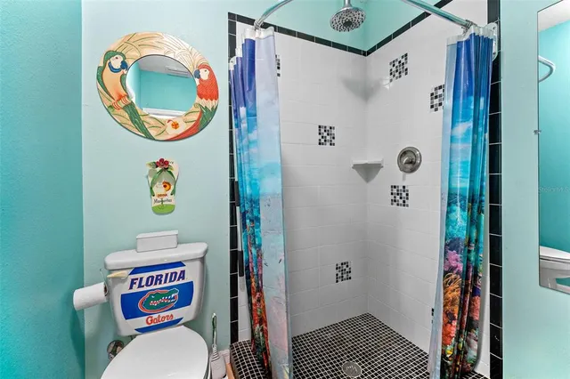 a bathroom with a toilet and a sink