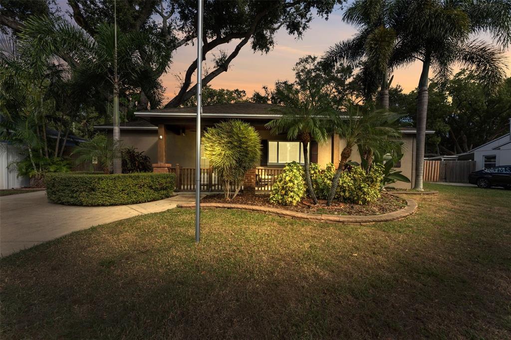 1441 Santa Anna Drive Dunedin, FL 34698 - Photo 31 of 34 a view of a swimming pool with a patio