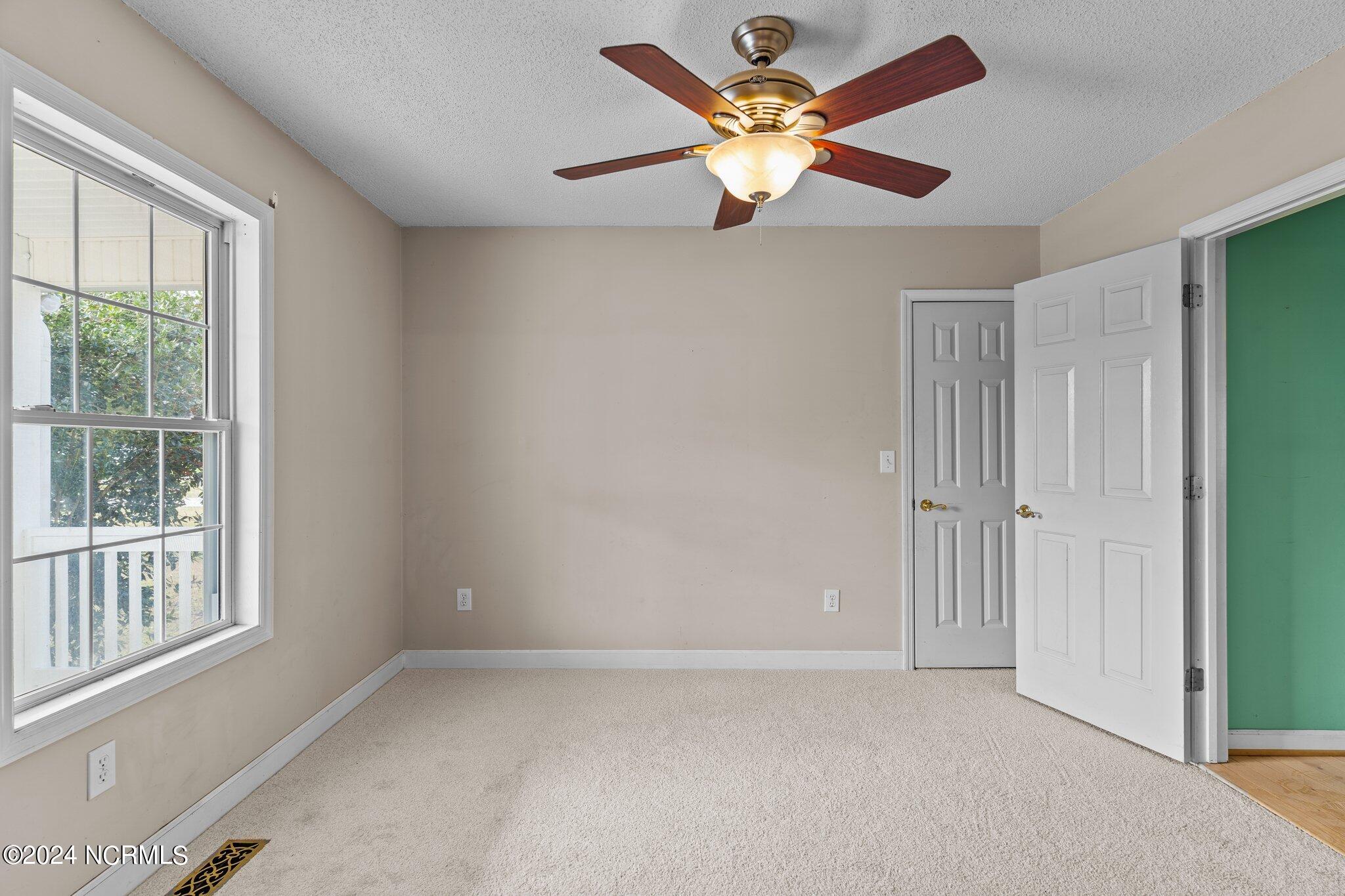 414 Governors Road Southeast Winnabow, NC 28479 - Photo 7 of 31 Front bedroom 1