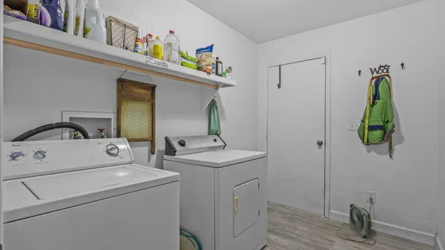 a utility room with dryer and washer