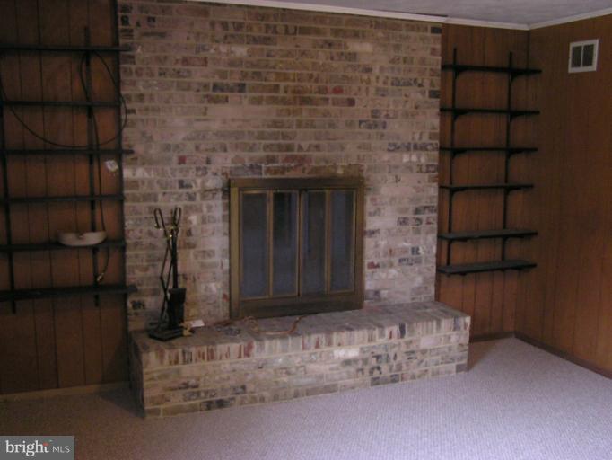 140 Magothy Beach Road Pasadena, MD 21122 - Photo 10 of 28 Wood burning FP in Family Rm