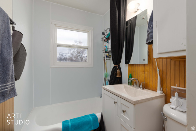 875 Patterson Street Ogden, UT 84403 - Photo 13 of 38 Full bath with vanity and wooden walls