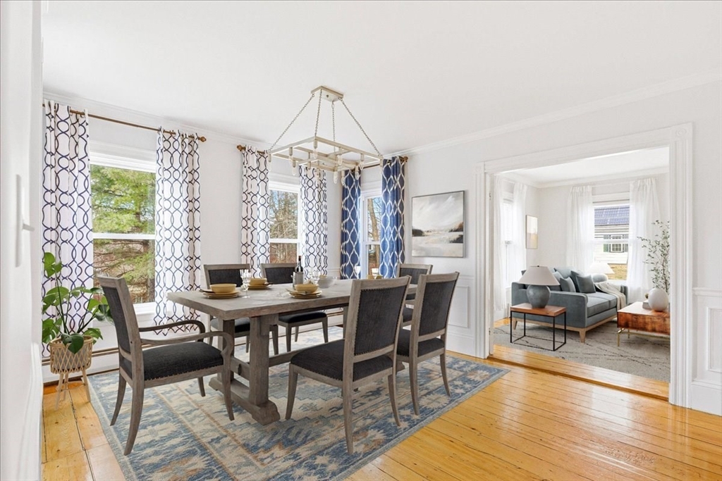 16 Howard Avenue Holbrook, MA 02343 - Photo 15 of 40 a view of a dining room with furniture window and wooden floor