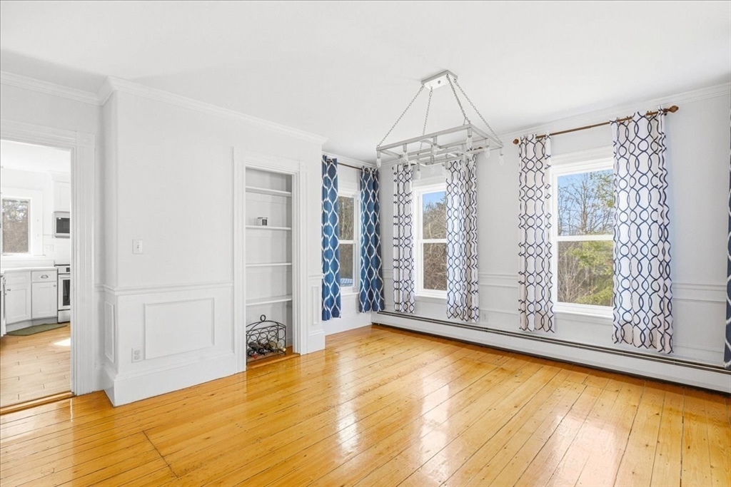 16 Howard Avenue Holbrook, MA 02343 - Photo 18 of 40 a view of livingroom with furniture wooden floor and window