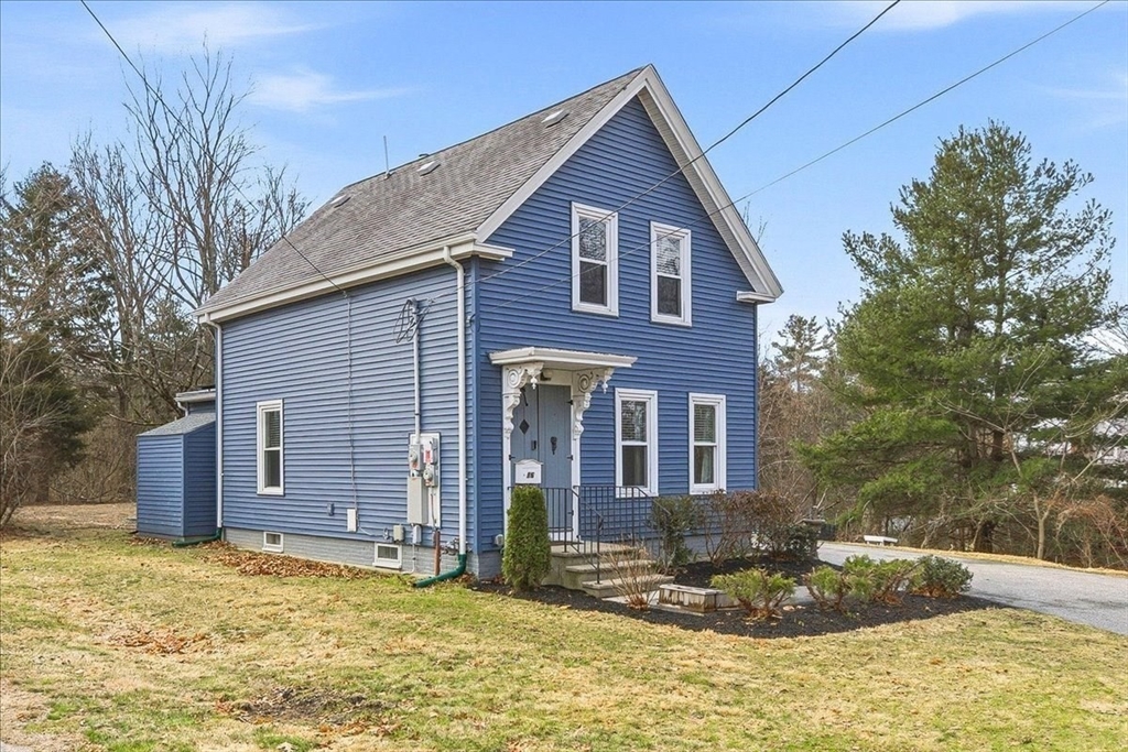 16 Howard Avenue Holbrook, MA 02343 - Photo 2 of 40 a front view of a house with a yard