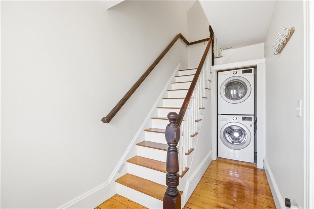 16 Howard Avenue Holbrook, MA 02343 - Photo 25 of 40 a view of entryway with washer and dryer