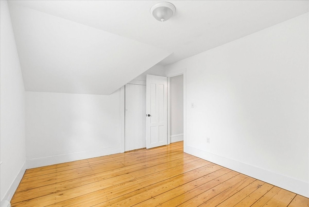 16 Howard Avenue Holbrook, MA 02343 - Photo 33 of 40 a view of empty room with wooden floor