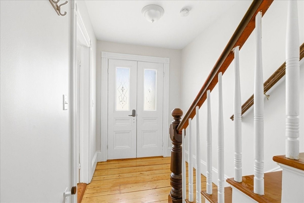 16 Howard Avenue Holbrook, MA 02343 - Photo 6 of 40 a view of an entryway with staircase