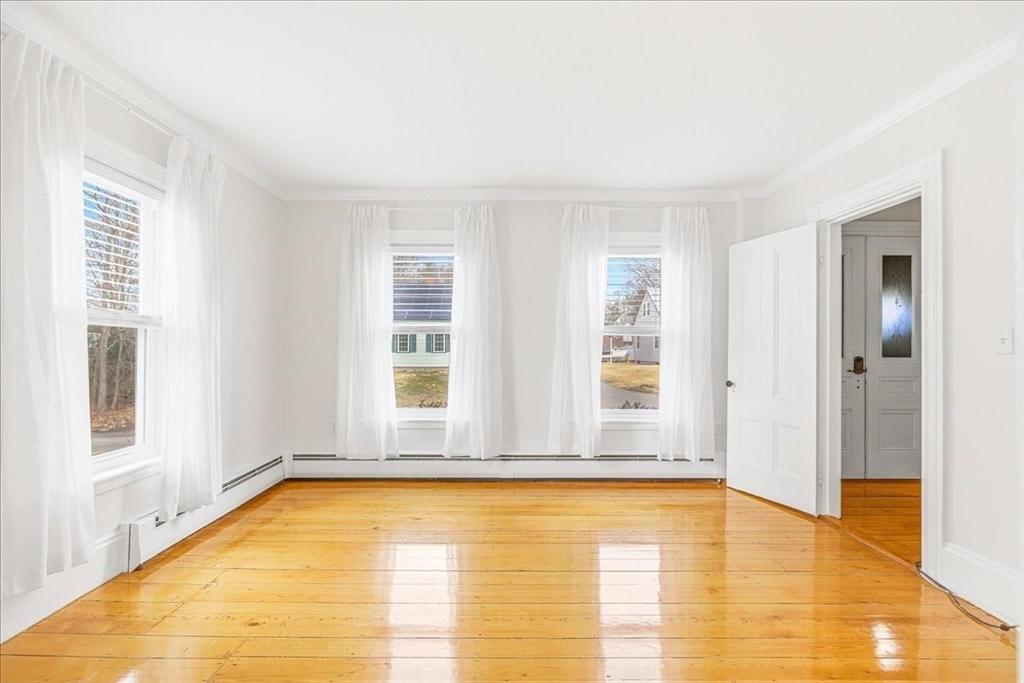 16 Howard Avenue Holbrook, MA 02343 - Photo 7 of 40 a view of an empty room with glass door