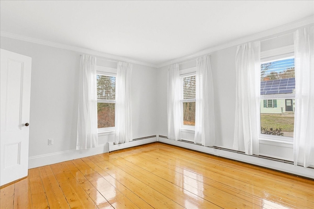 16 Howard Avenue Holbrook, MA 02343 - Photo 9 of 40 a view of an empty room with a window