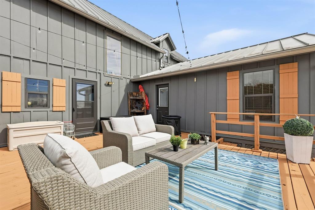 309 Sanders Road Denton, TX 76210 - Photo 24 of 40 a outdoor space with patio furniture