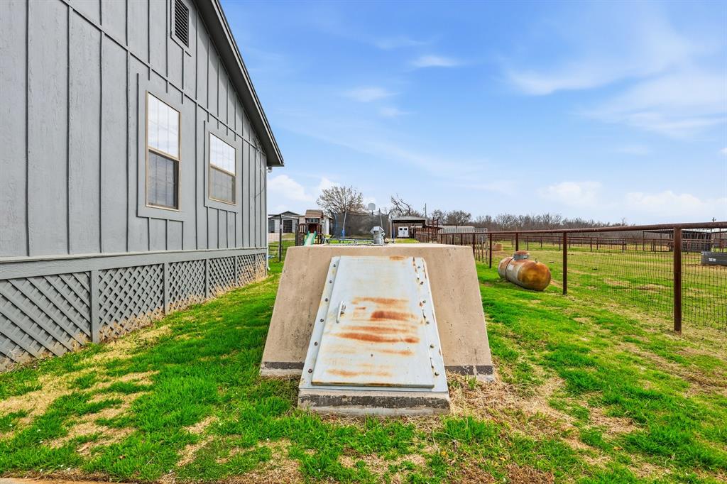 309 Sanders Road Denton, TX 76210 - Photo 38 of 40 a view of a large trees with a yard