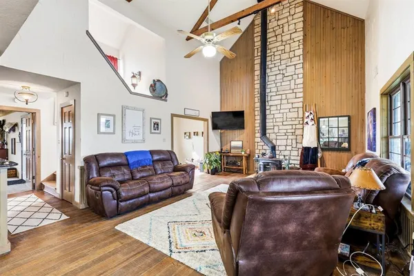a living room with furniture and a window