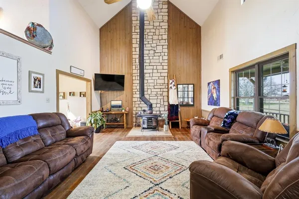 a living room with furniture or couch and a fireplace