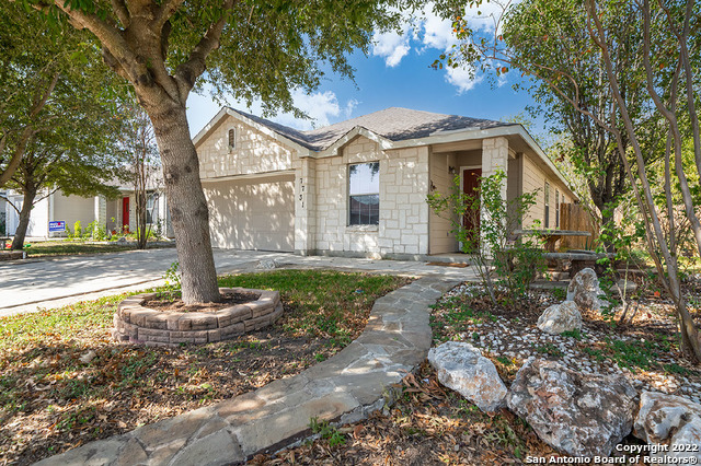7731 Saddle Run Selma, TX 78154 - Photo 1 of 1 a front view of a house with a yard