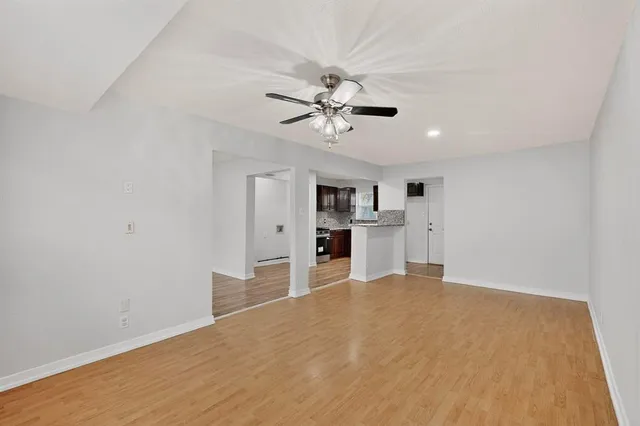 a view of a kitchen with a sink and a kitchen view