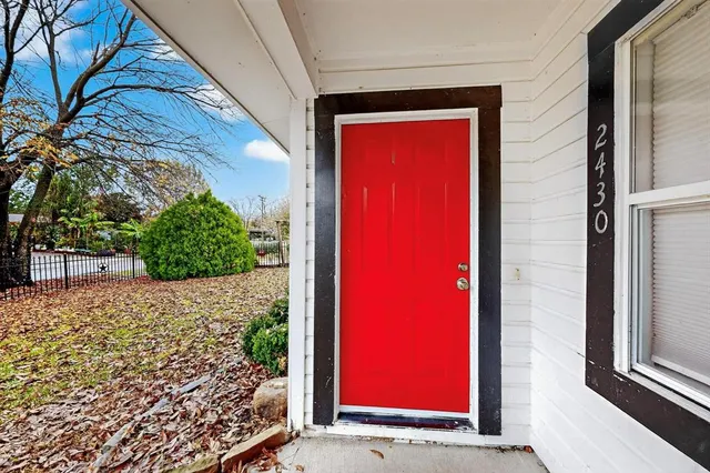 a view of a red door and small space