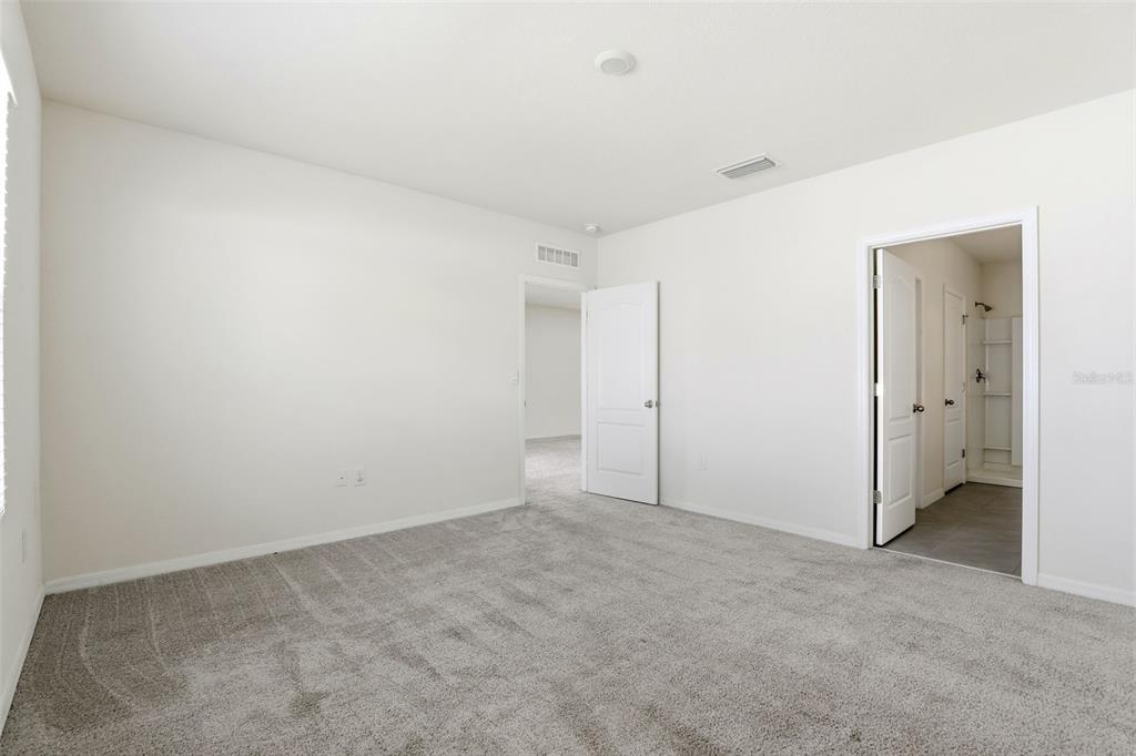 6777 Huntleigh Hammock Road Harmony, FL 34773 - Photo 15 of 32 a view of an empty room