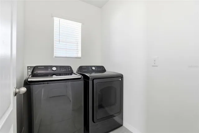 a view of a back yard of the house